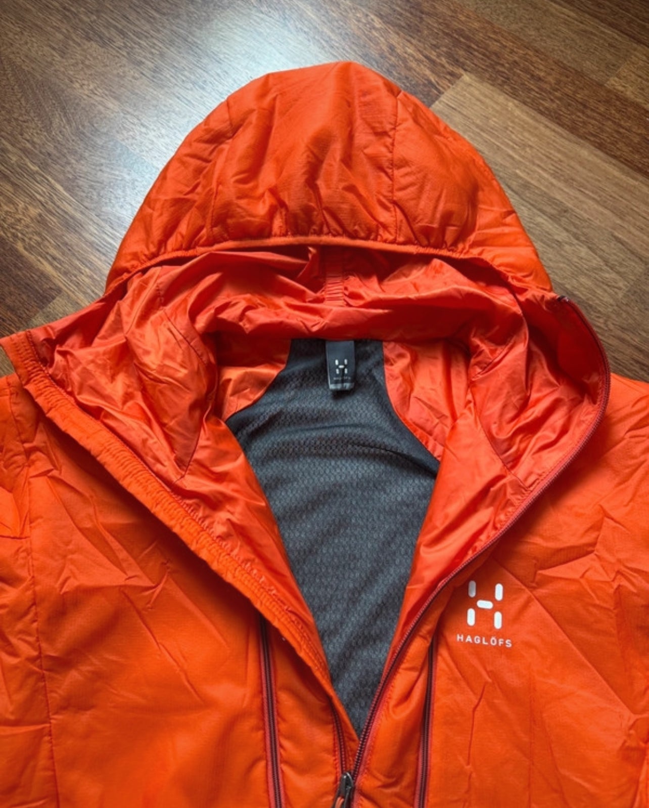 Stepp Jacke von Haglöfs Polartec mit Kapuze (L Herren) orange