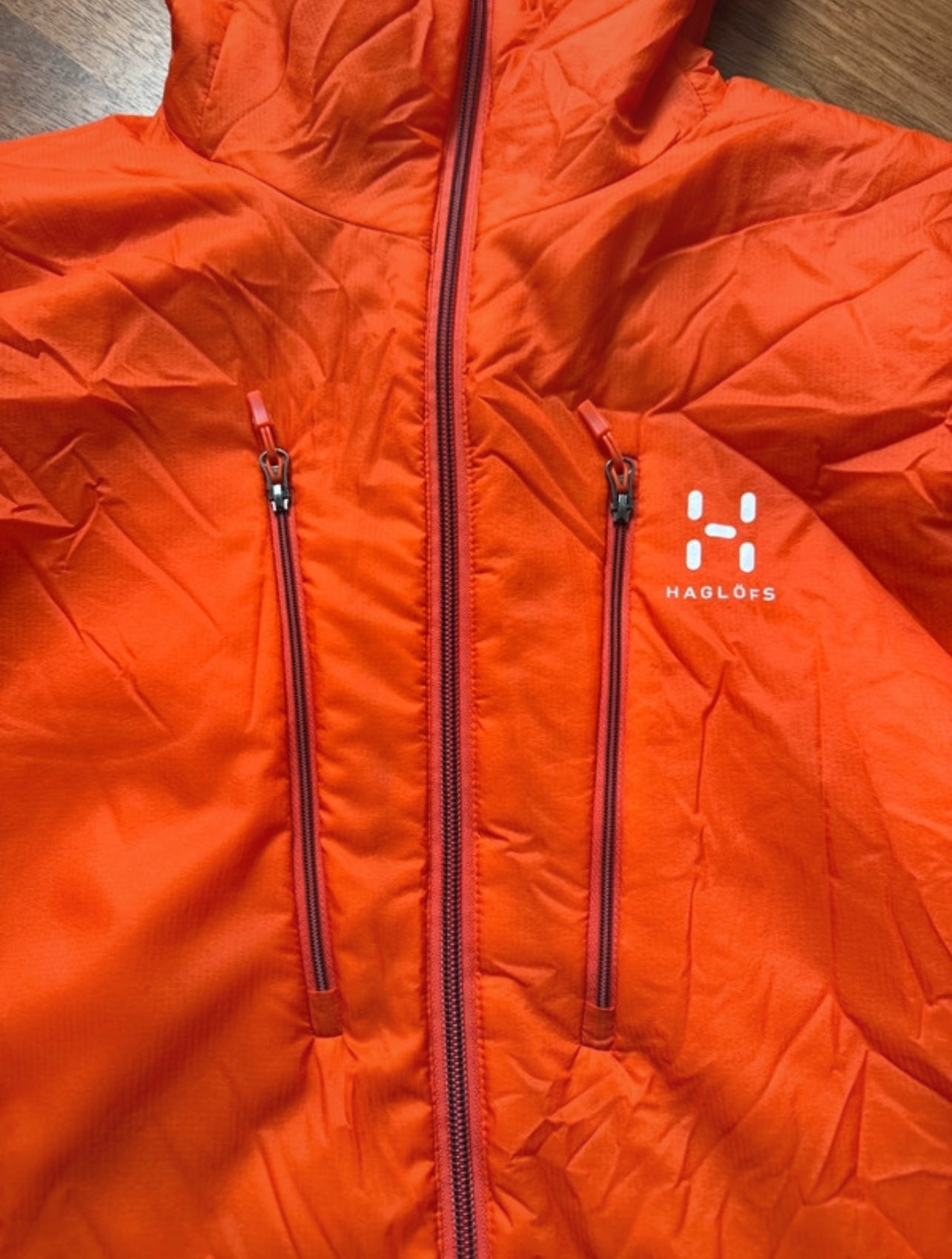 Stepp Jacke von Haglöfs Polartec mit Kapuze (L Herren) orange