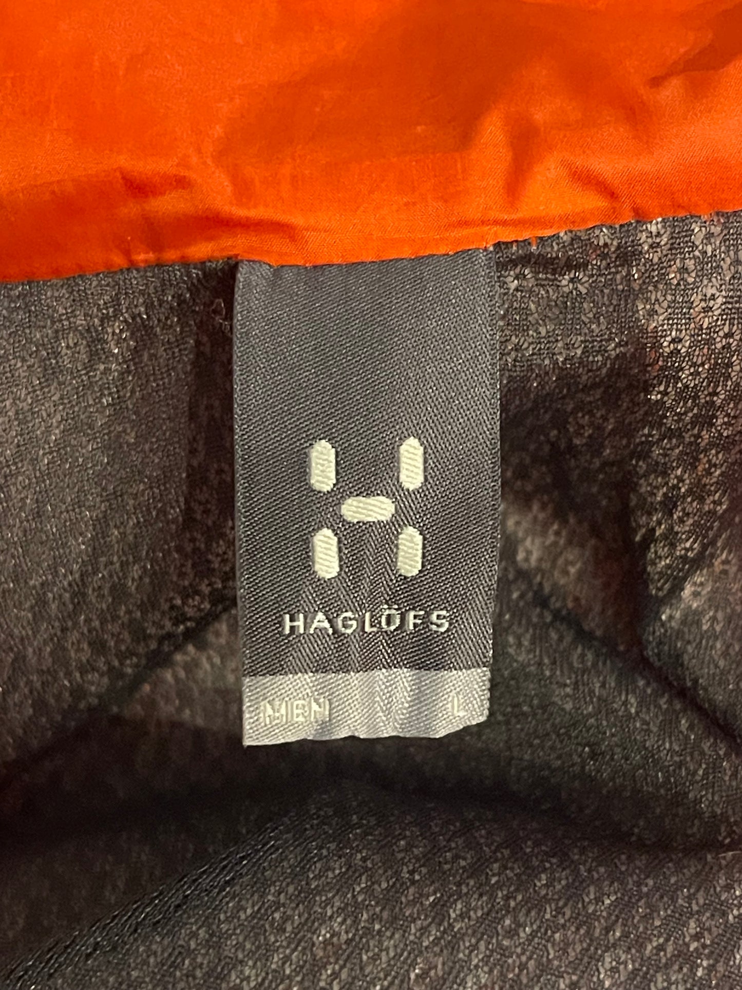 Stepp Jacke von Haglöfs Polartec mit Kapuze (L Herren) orange