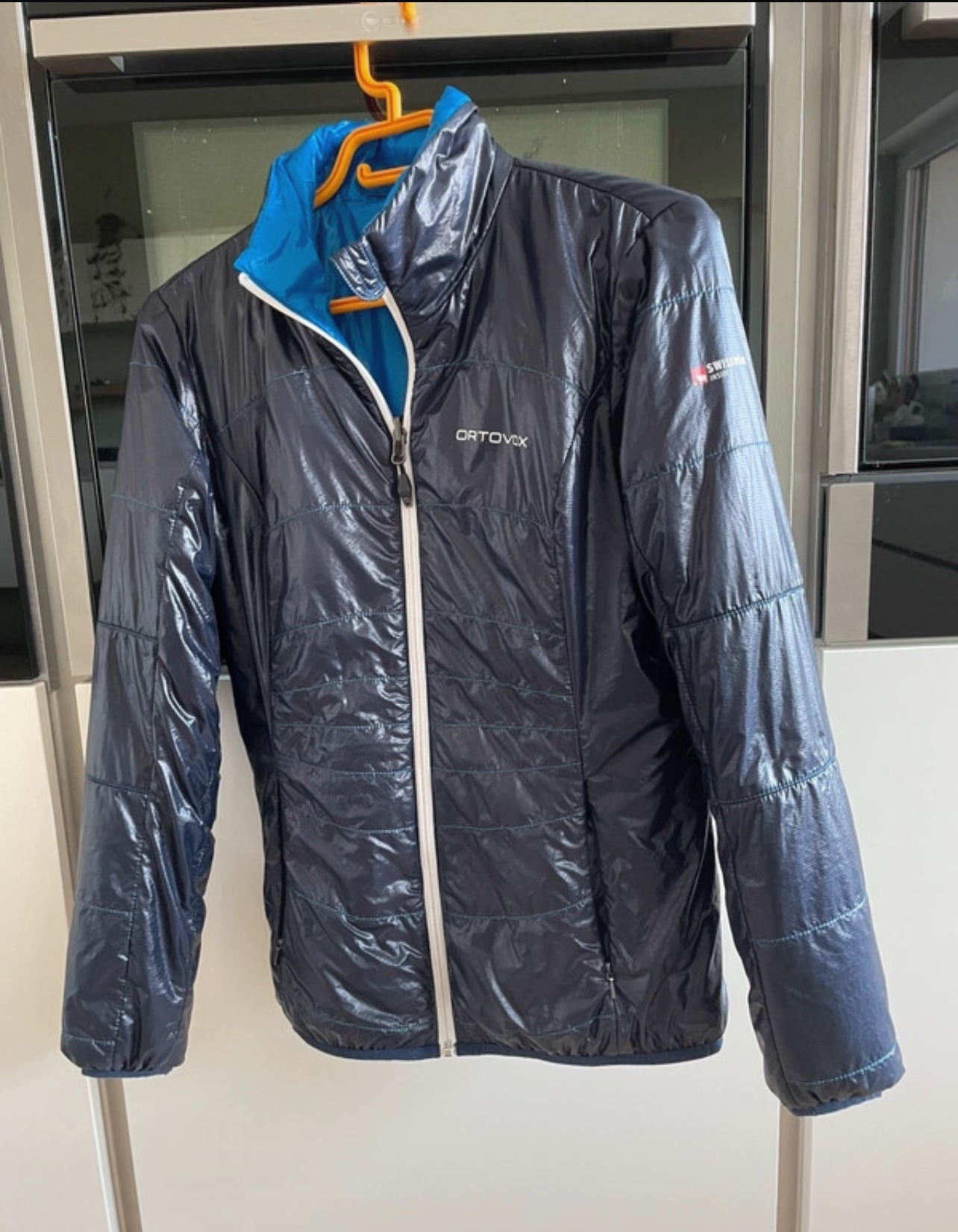 Wende Jacke von Ortovox Swisswool inside (L Damen) schwarz blau