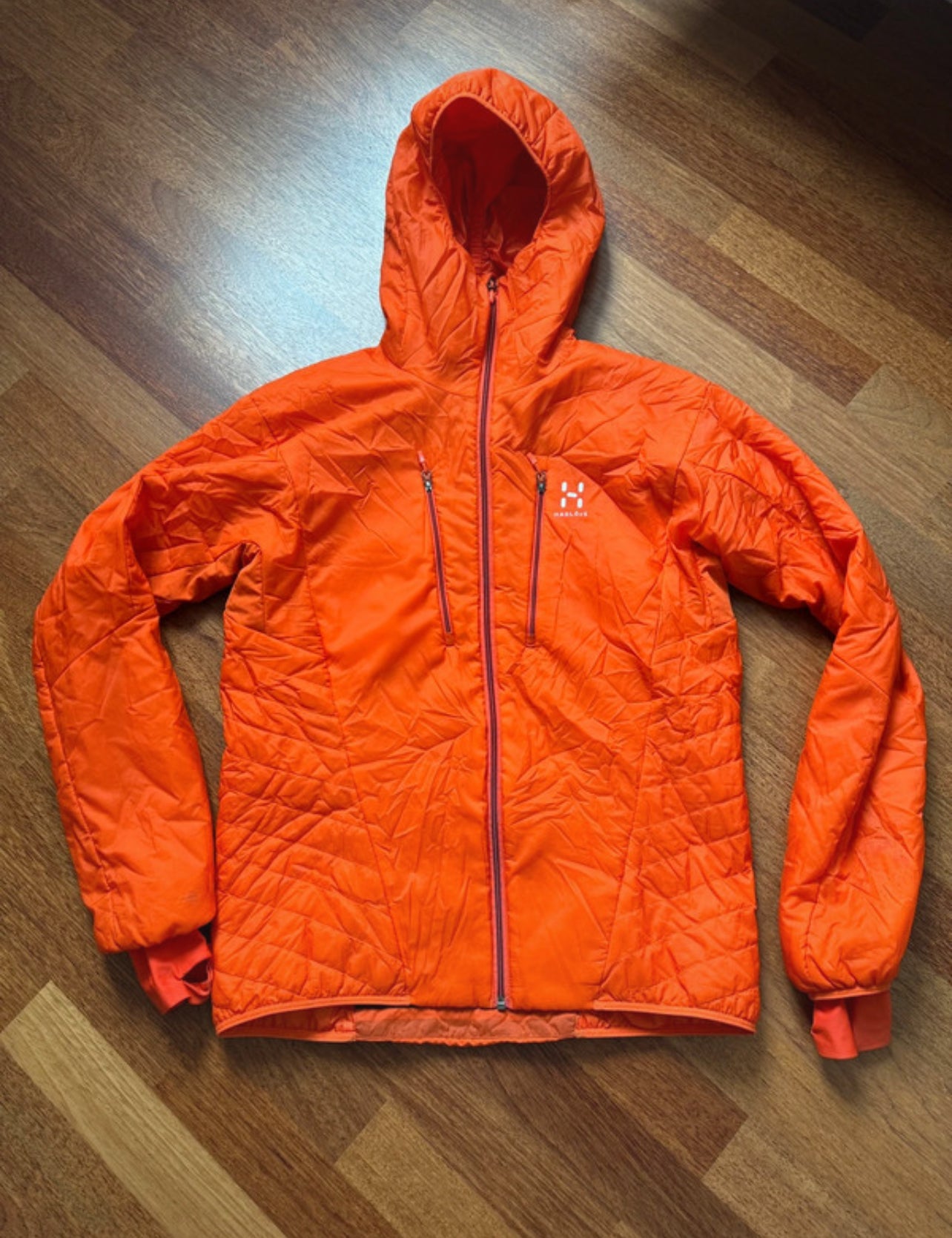 Stepp Jacke von Haglöfs Polartec mit Kapuze (L Herren) orange