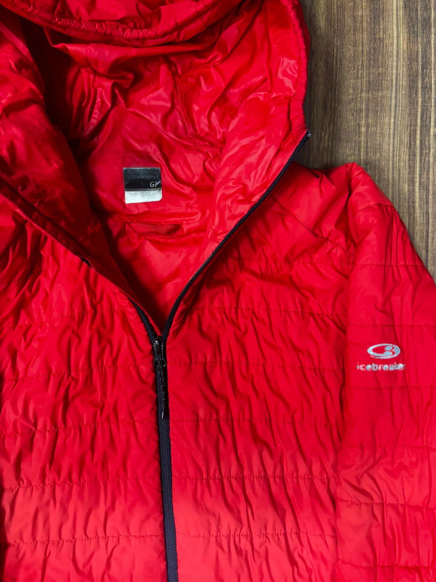 Kapuzen Stepp Jacke von Icebreaker Merino (L Herren) Isolation rot