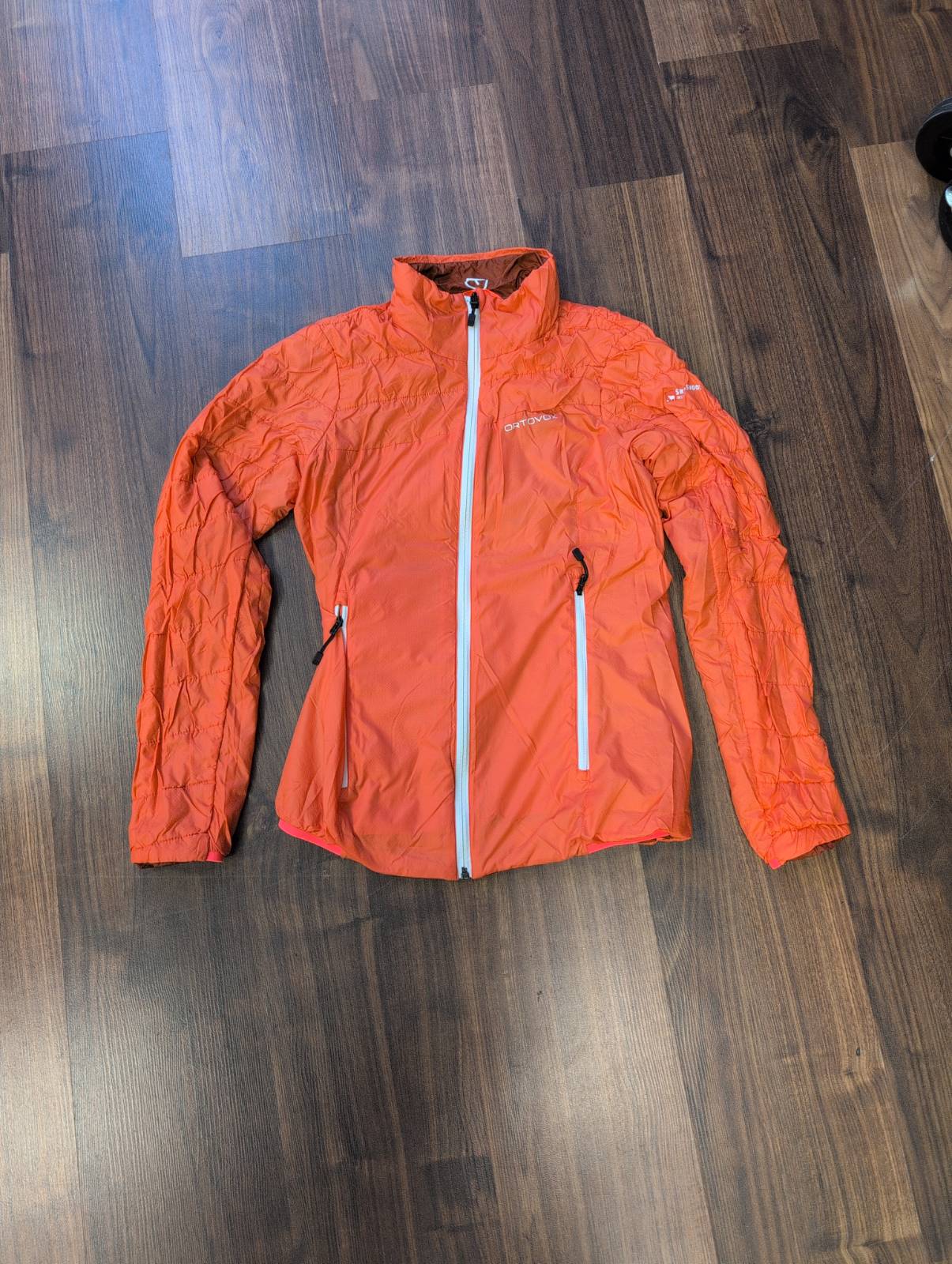 Daunen / Wolle Wende Jacke Ortovox (S Damen) bordeaux / korallenrot - wanderlich.com