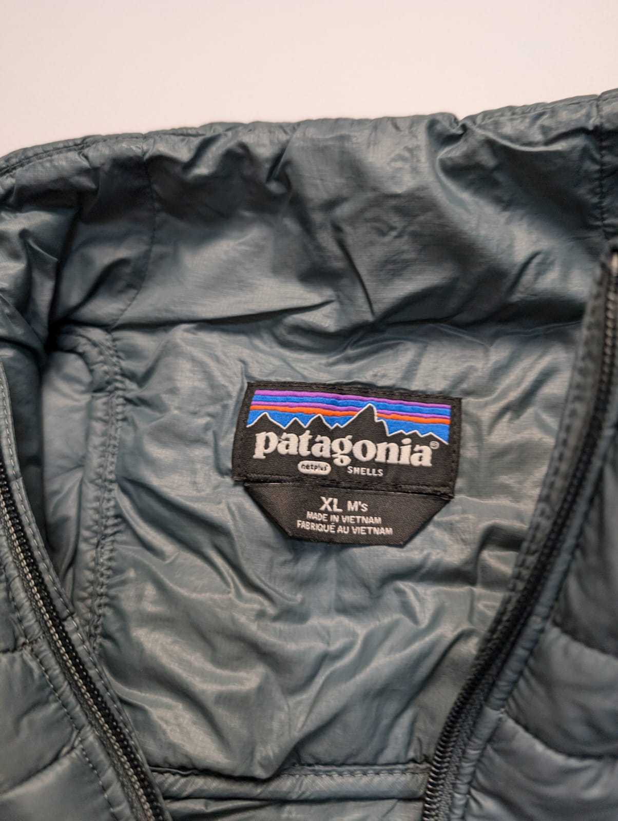 Patagonia Isolations Jacke Nano Puff (XL Herren) grau