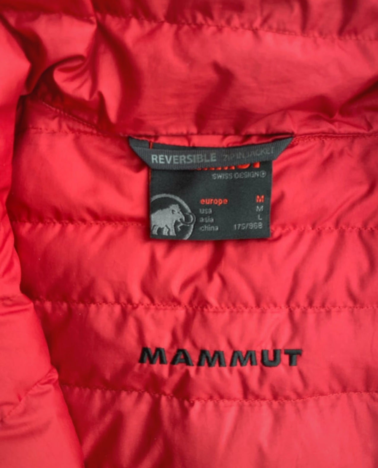 Daunen Wende Jacke von Mammut (M Herren) rot schwarz