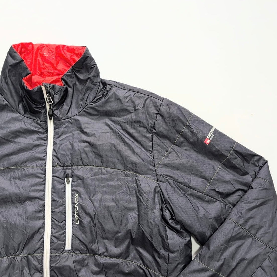 Wende Jacke Ortovox Wolle / Daune (XL Herren) schwarz orange