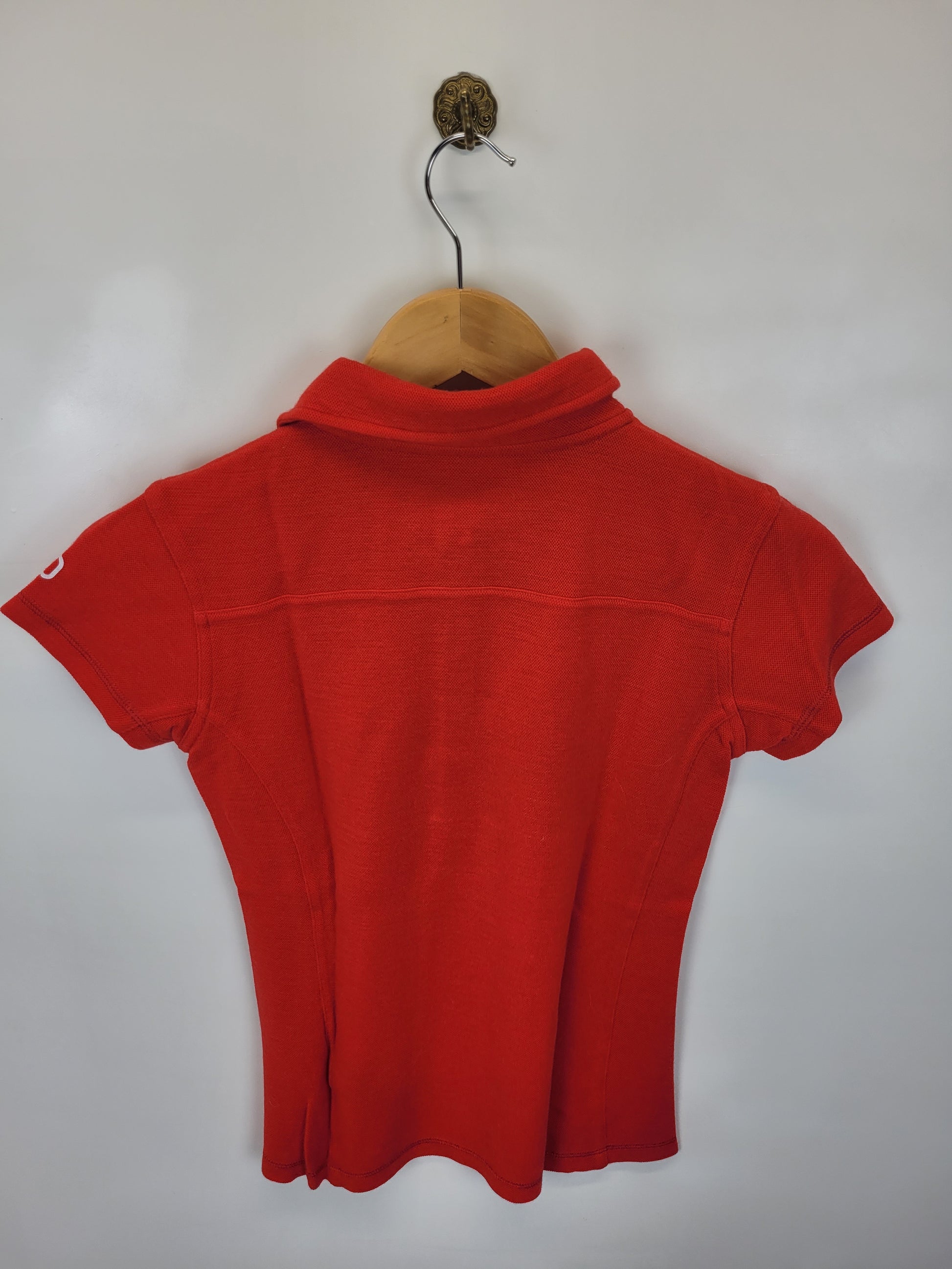 Rotes Poloshirt von Ortovox in Größe XS (Damen) - wanderlich.com