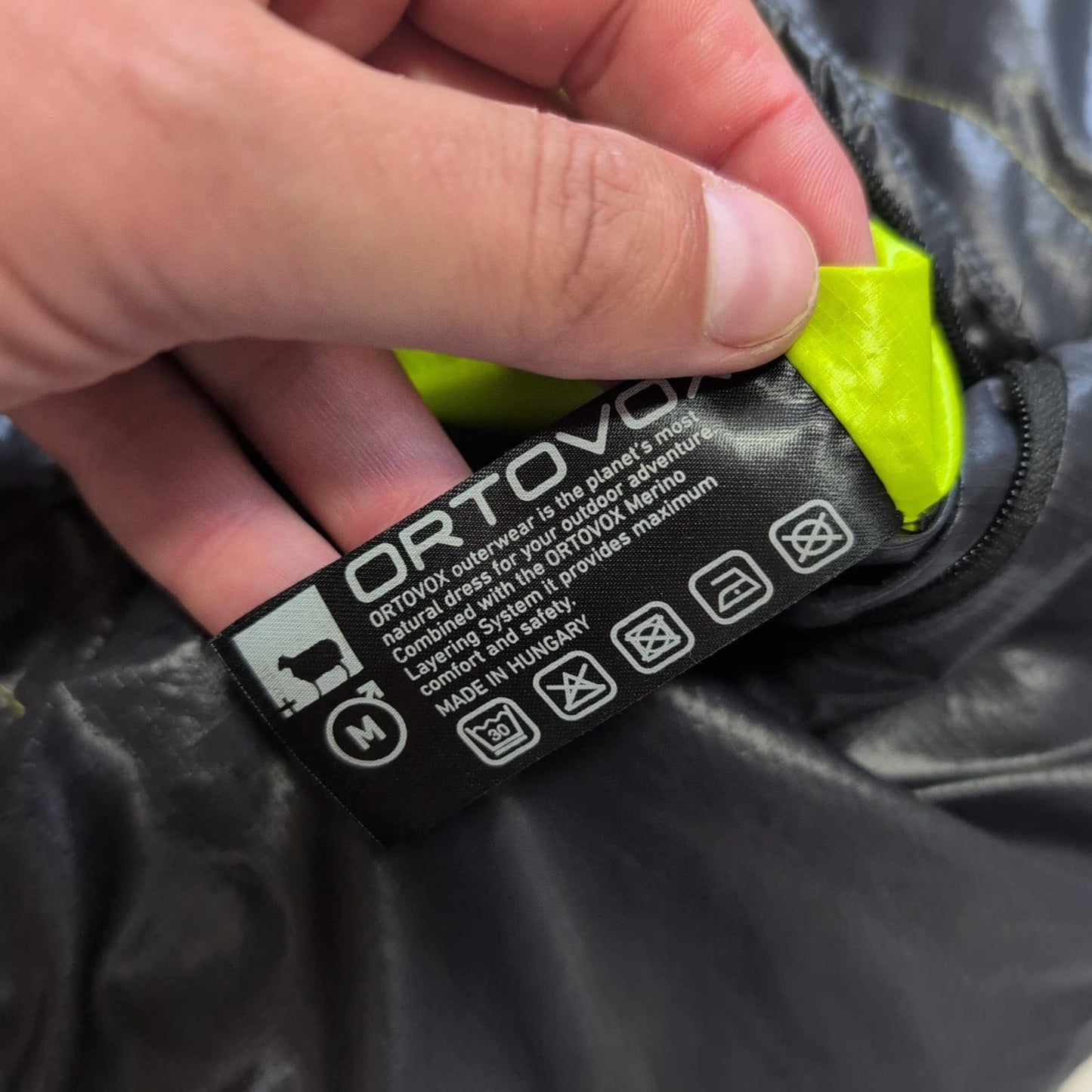 Wende- Jacke Ortovox (M Herren) Swisswool inside schwarz grün