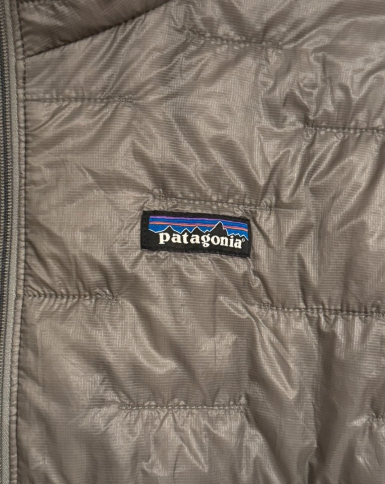 Patagonia Isolations Jacke (L Damen) Nano Puff grau