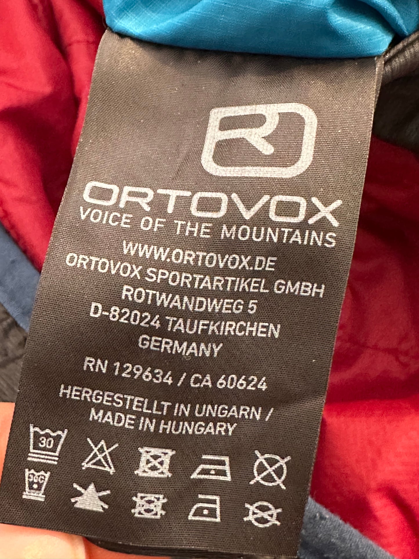 Wolle /Daunen Wende Jacke Ortovox (L Herren) rot blau graphit