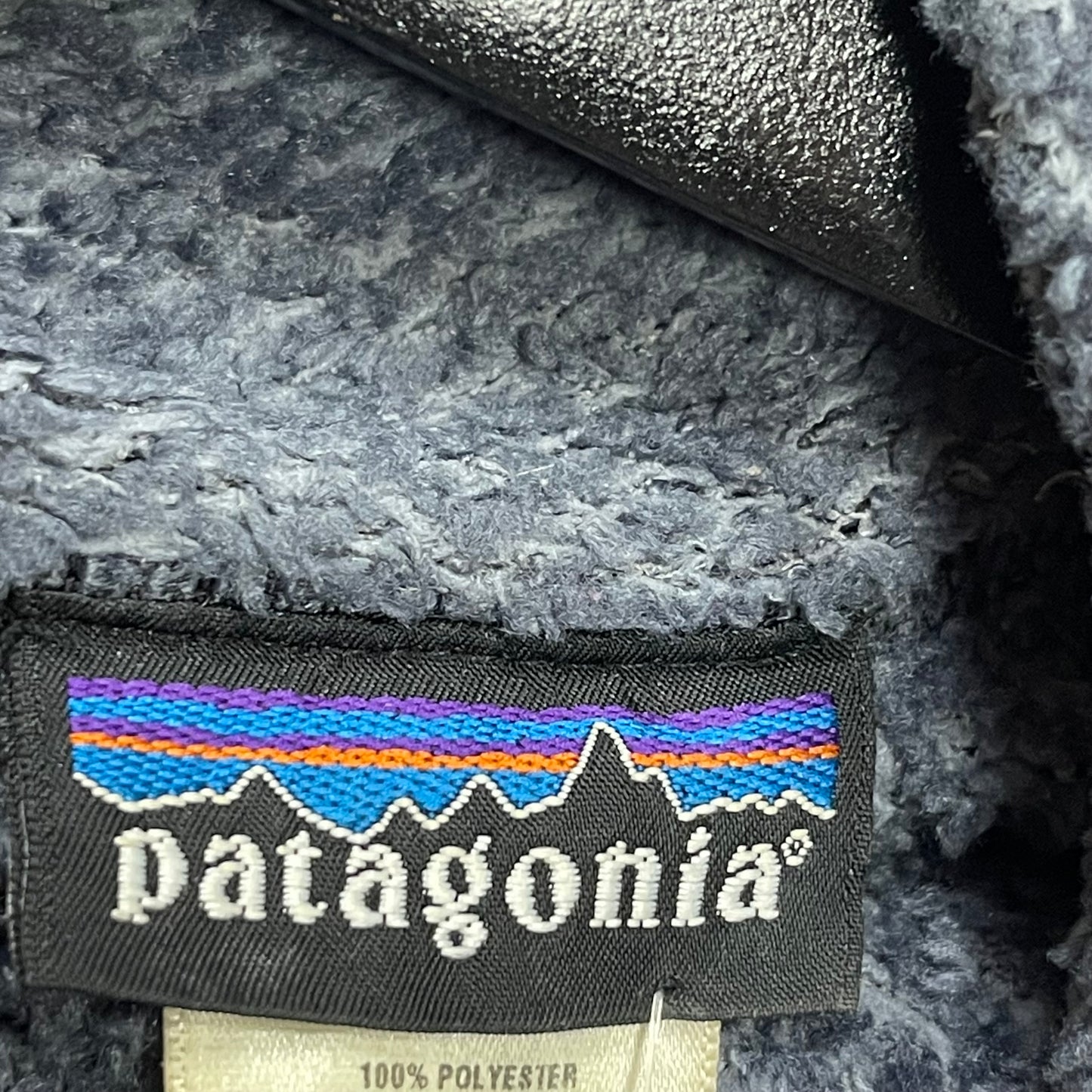 Patagonia Fleece Jacke R1® (L Herren) Pile Optik Teddy schwarz