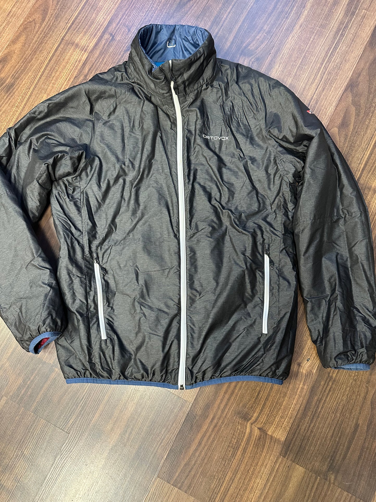 Wolle /Daunen Wende Jacke Ortovox (L Herren) rot blau graphit