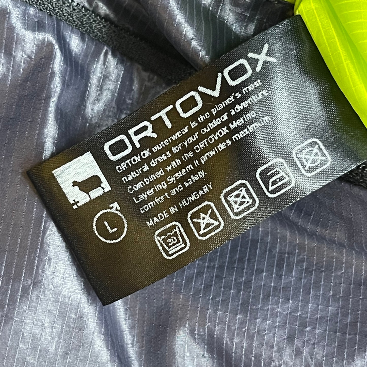 Wende- Jacke Ortovox (L Herren) Swisswool inside schwarz grün