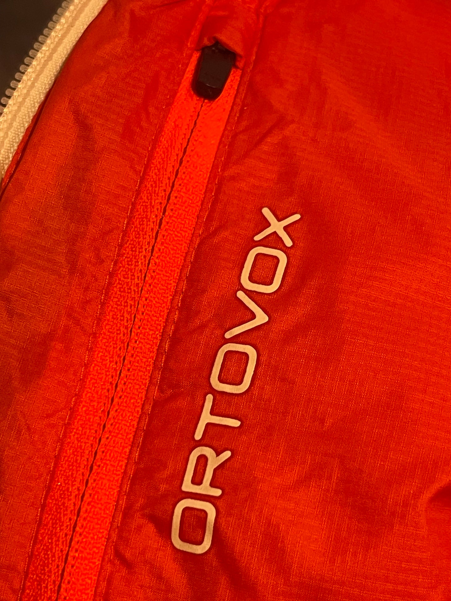 Wende Jacke Ortovox Wolle / Daune (XL Herren) schwarz orange