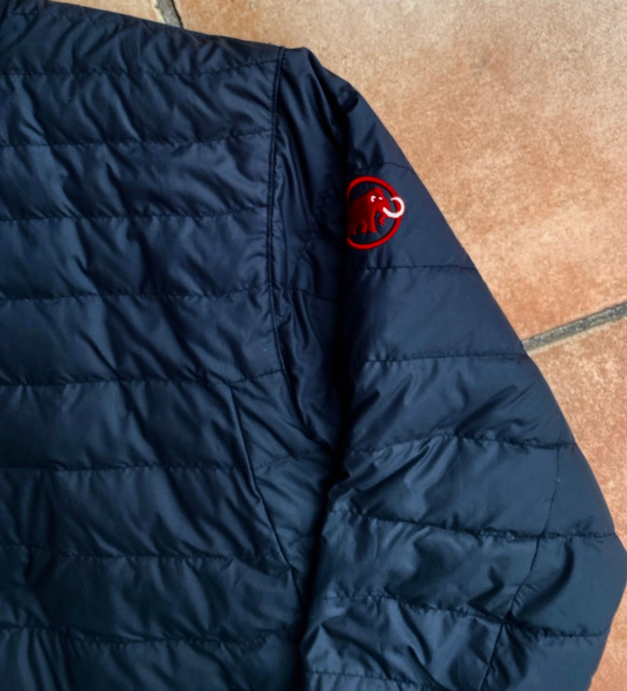 Daunen Wende Jacke von Mammut (M Herren) rot schwarz