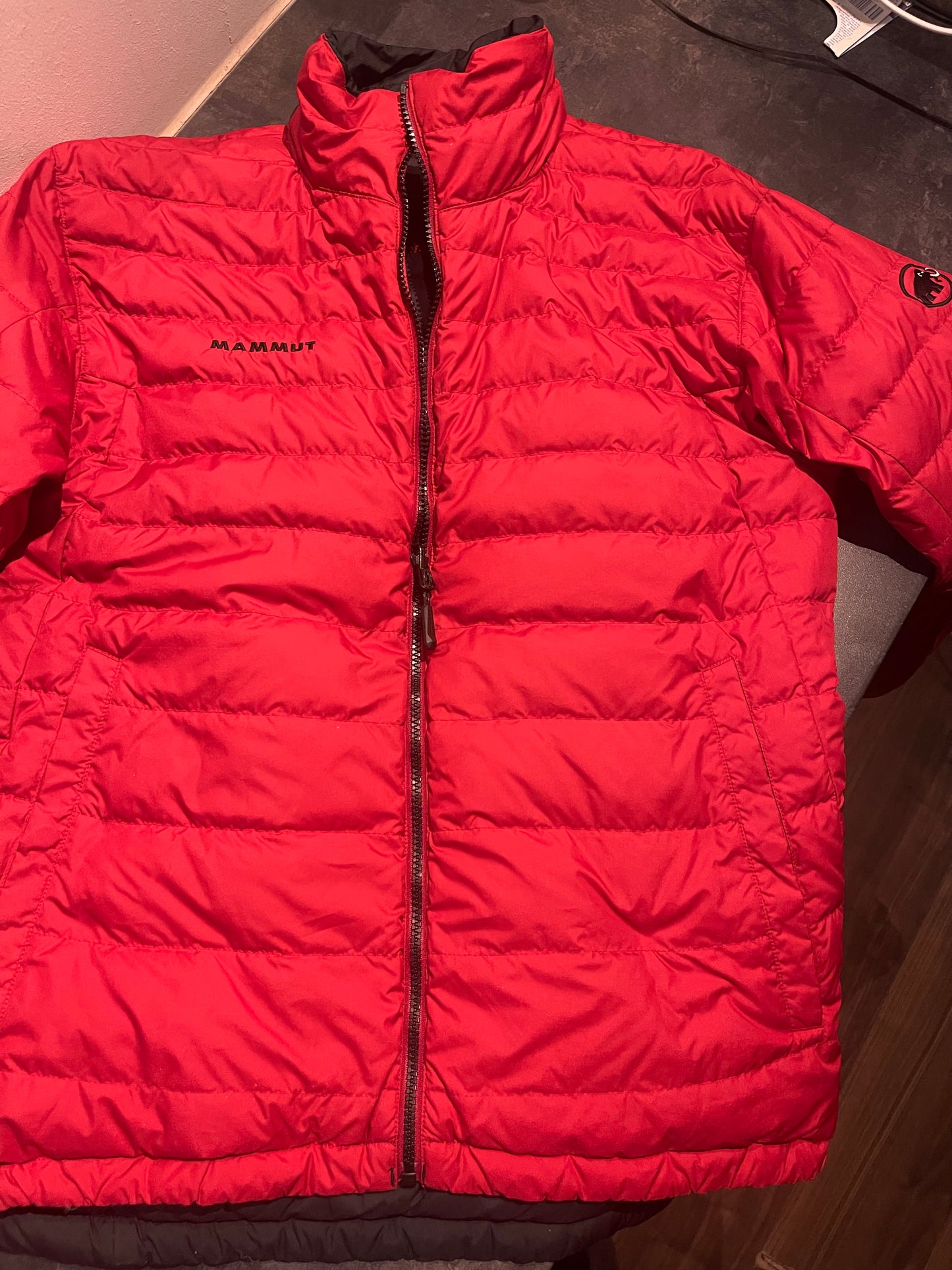 Daunen Wende Jacke von Mammut (M Herren) rot schwarz