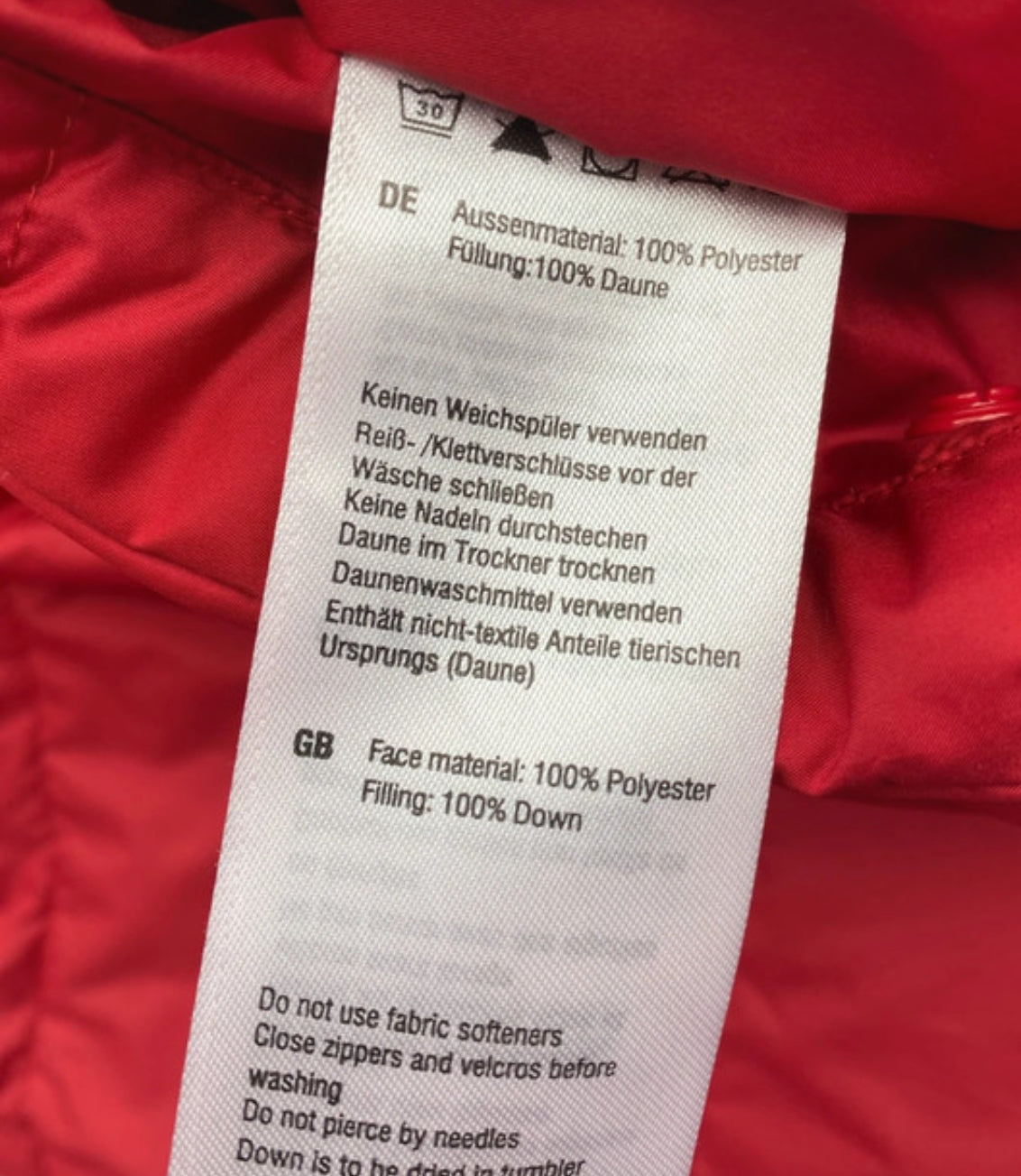 Daunen Wende Jacke von Mammut (M Herren) rot schwarz