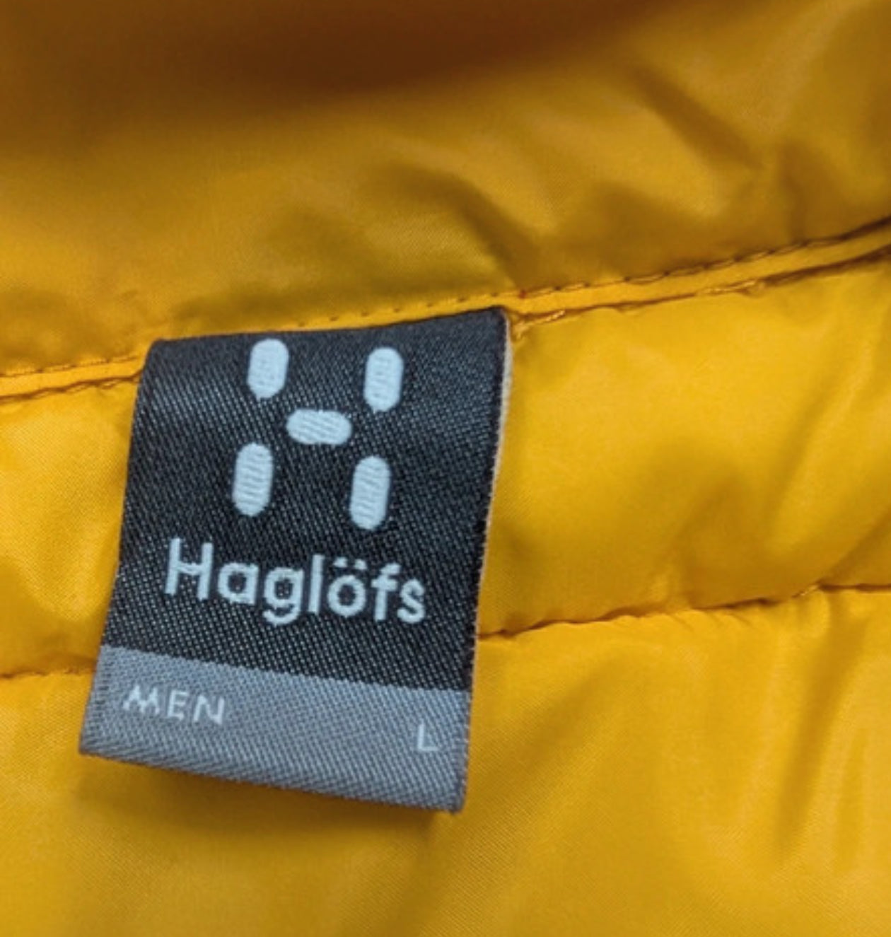 Isolations Stepp Jacke von Haglöfs (L Herren) Kunstdaune orange gelb