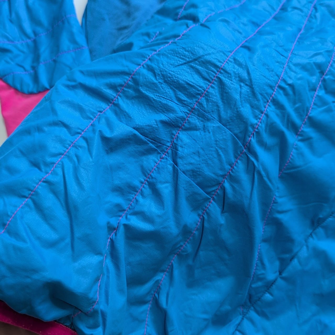 Wolle / Daunen Jacke von Ortovox (S Damen) blau mit Kapuze