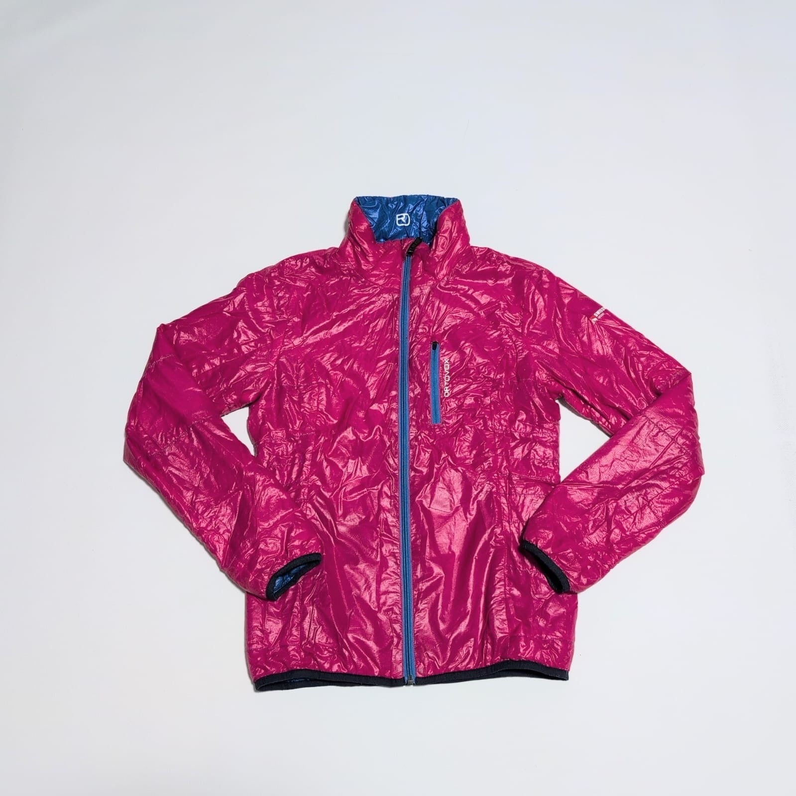Daunen / Wolle Wende Jacke Ortovox (S Damen) pink blau - wanderlich.com