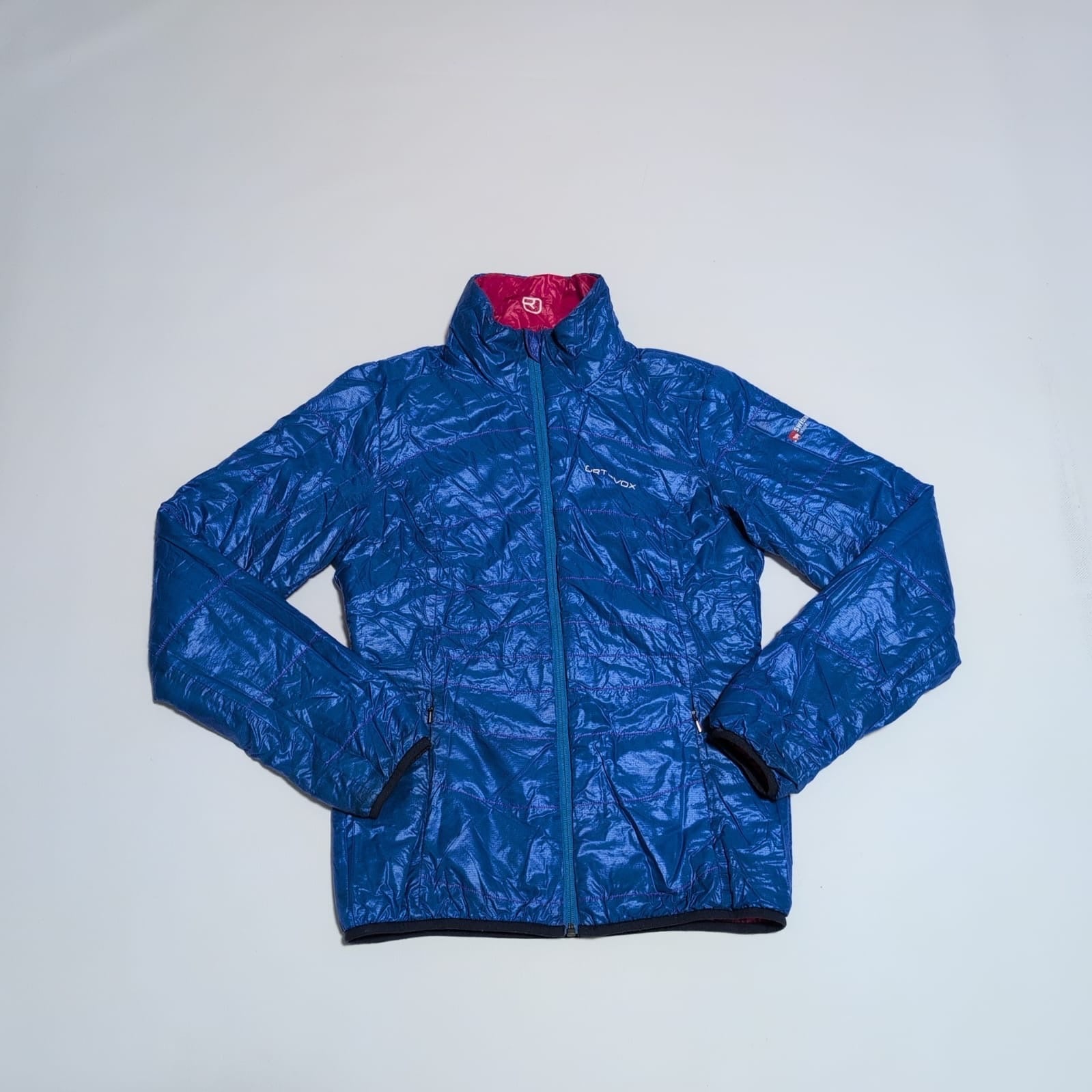 Daunen / Wolle Wende Jacke Ortovox (S Damen) pink blau - wanderlich.com