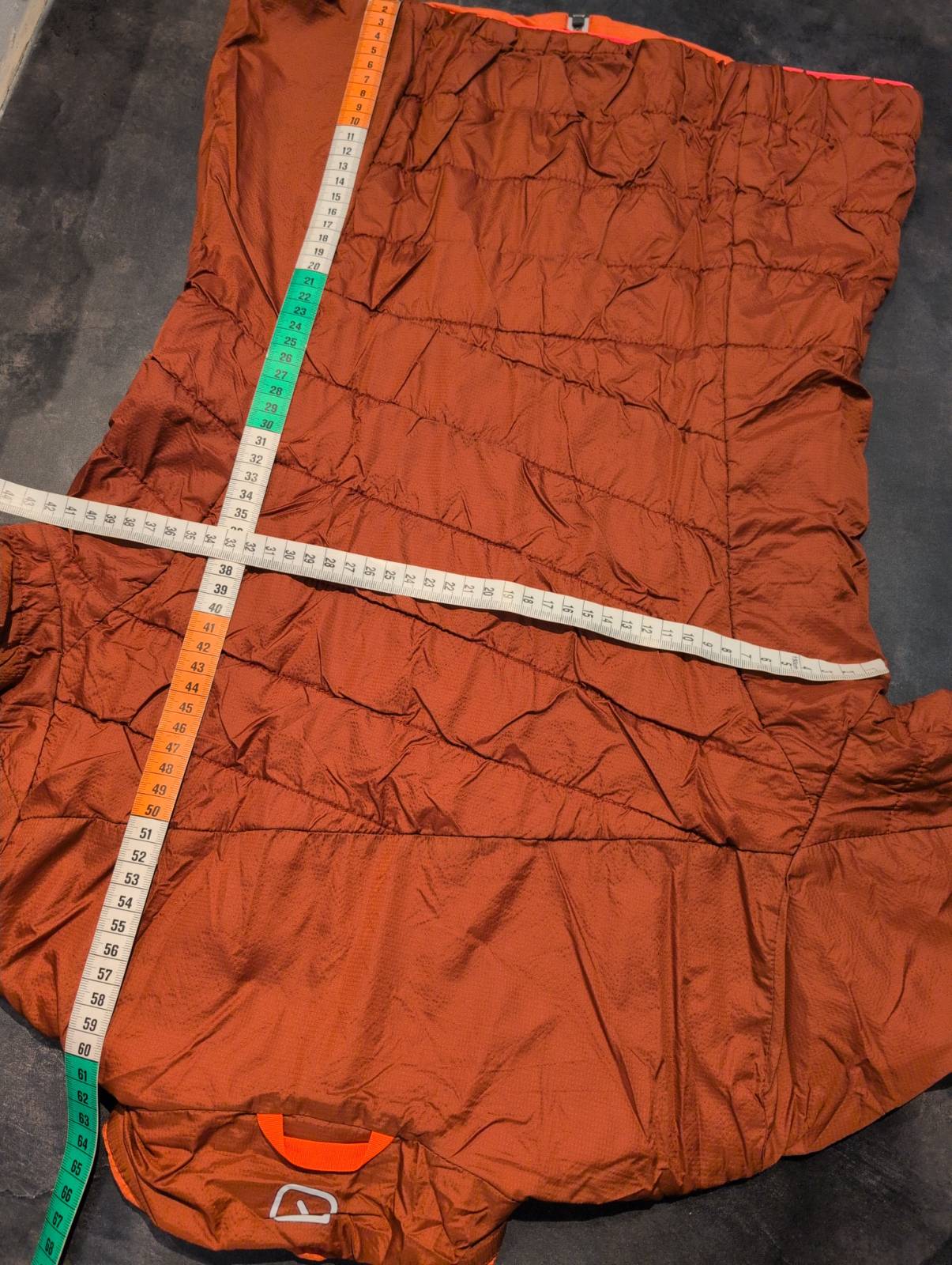 Daunen / Wolle Wende Jacke Ortovox (S Damen) bordeaux / korallenrot - wanderlich.com