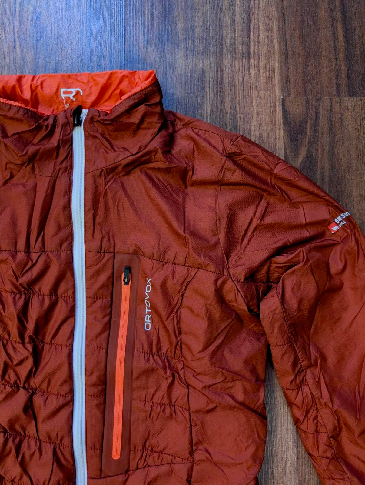 Daunen / Wolle Wende Jacke Ortovox (S Damen) bordeaux / korallenrot - wanderlich.com