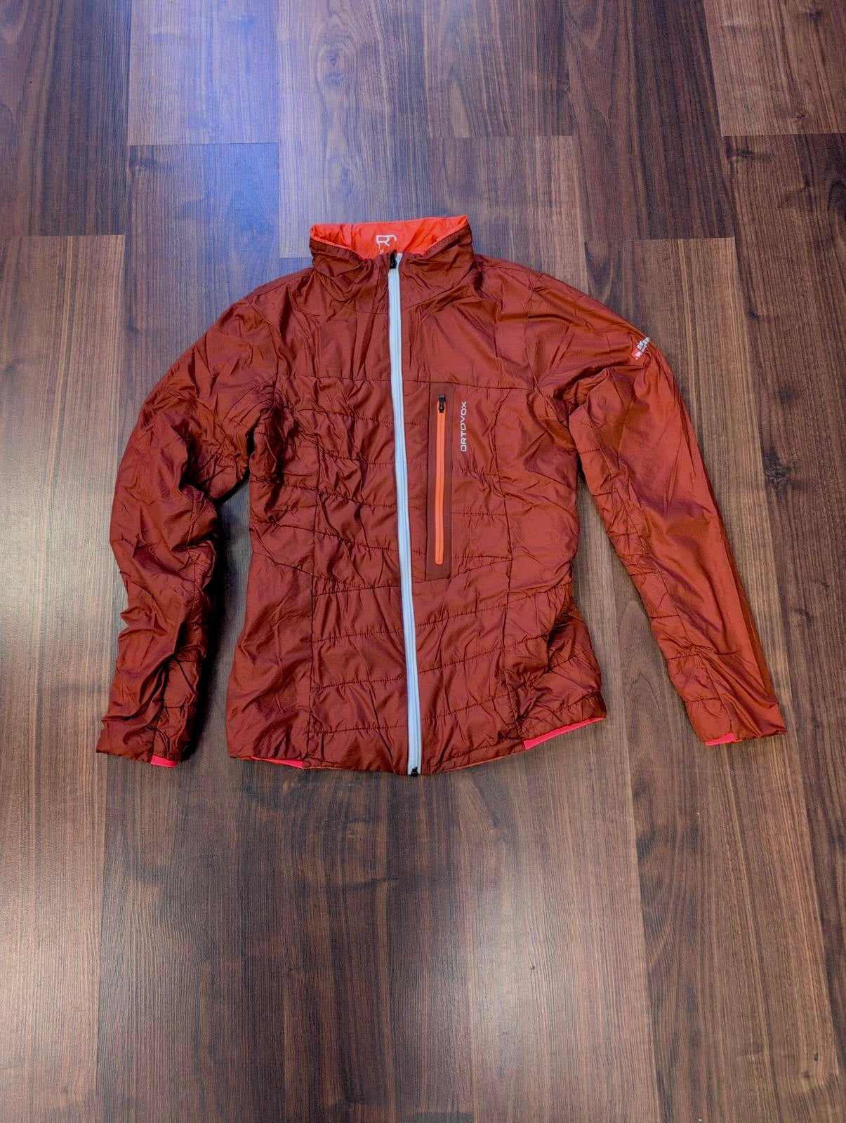 Daunen / Wolle Wende Jacke Ortovox (S Damen) bordeaux / korallenrot - wanderlich.com