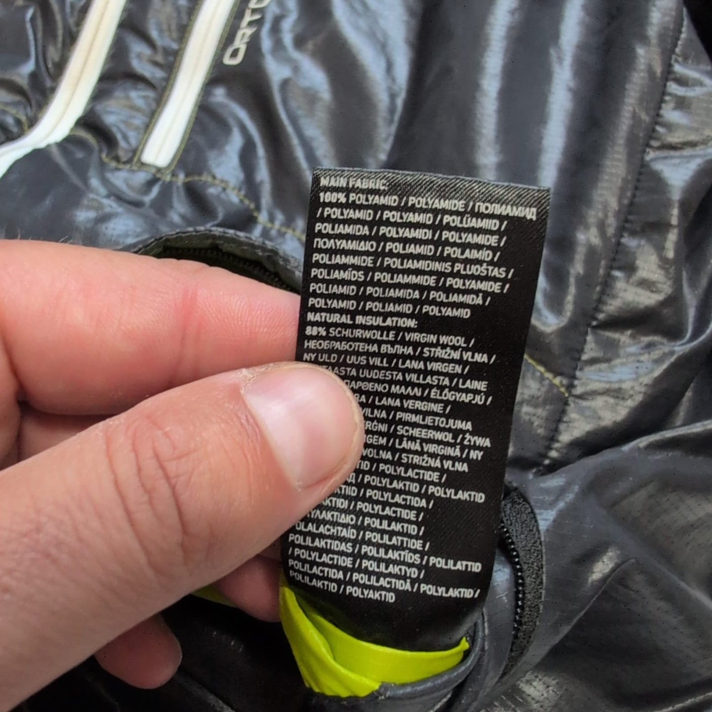 Wende- Jacke Ortovox (M Herren) Swisswool inside schwarz grün