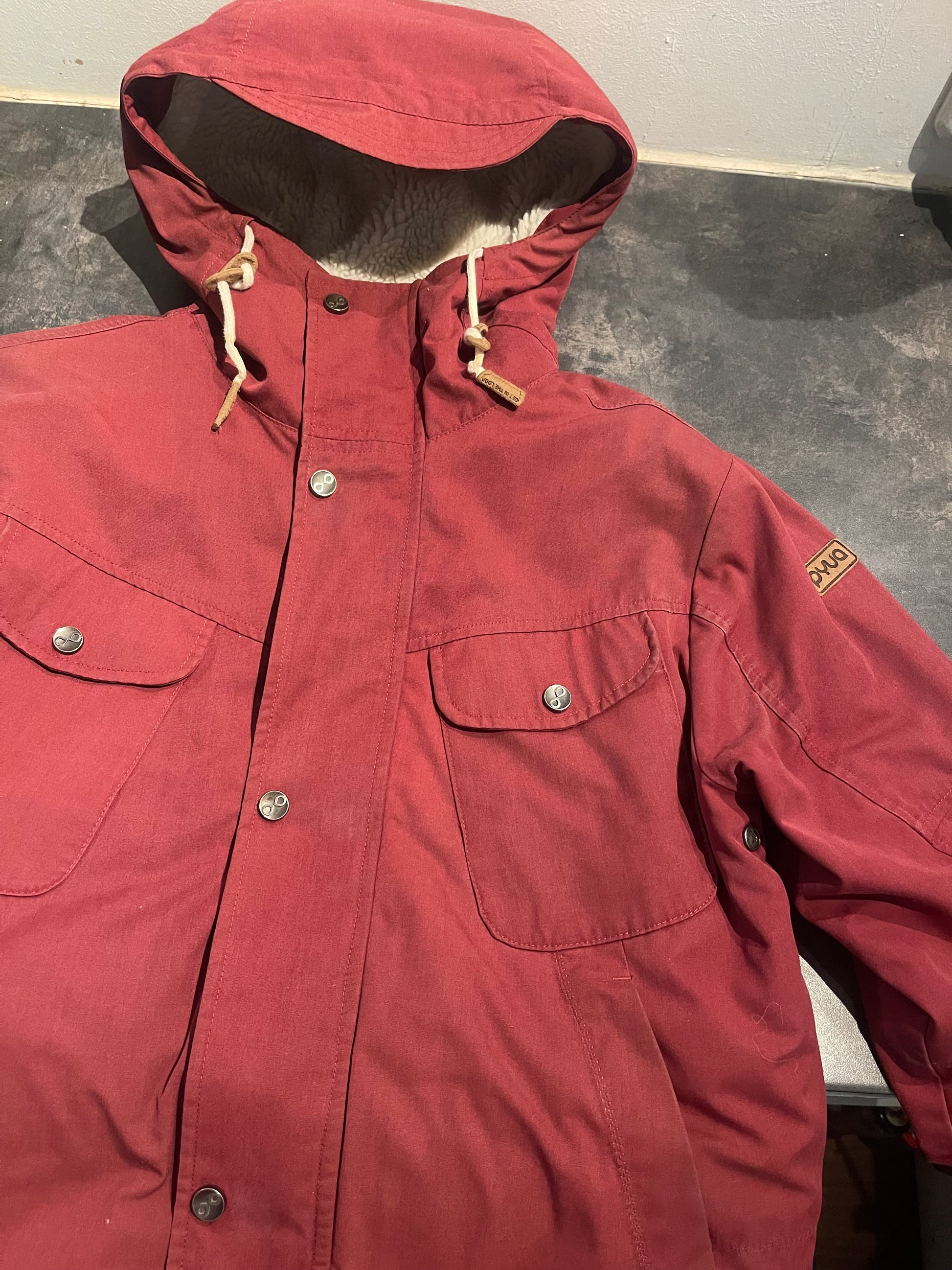 Gefütterte Jacke von Pyua (S Herren / M Damen) Parka dunkelrot - wanderlich.com