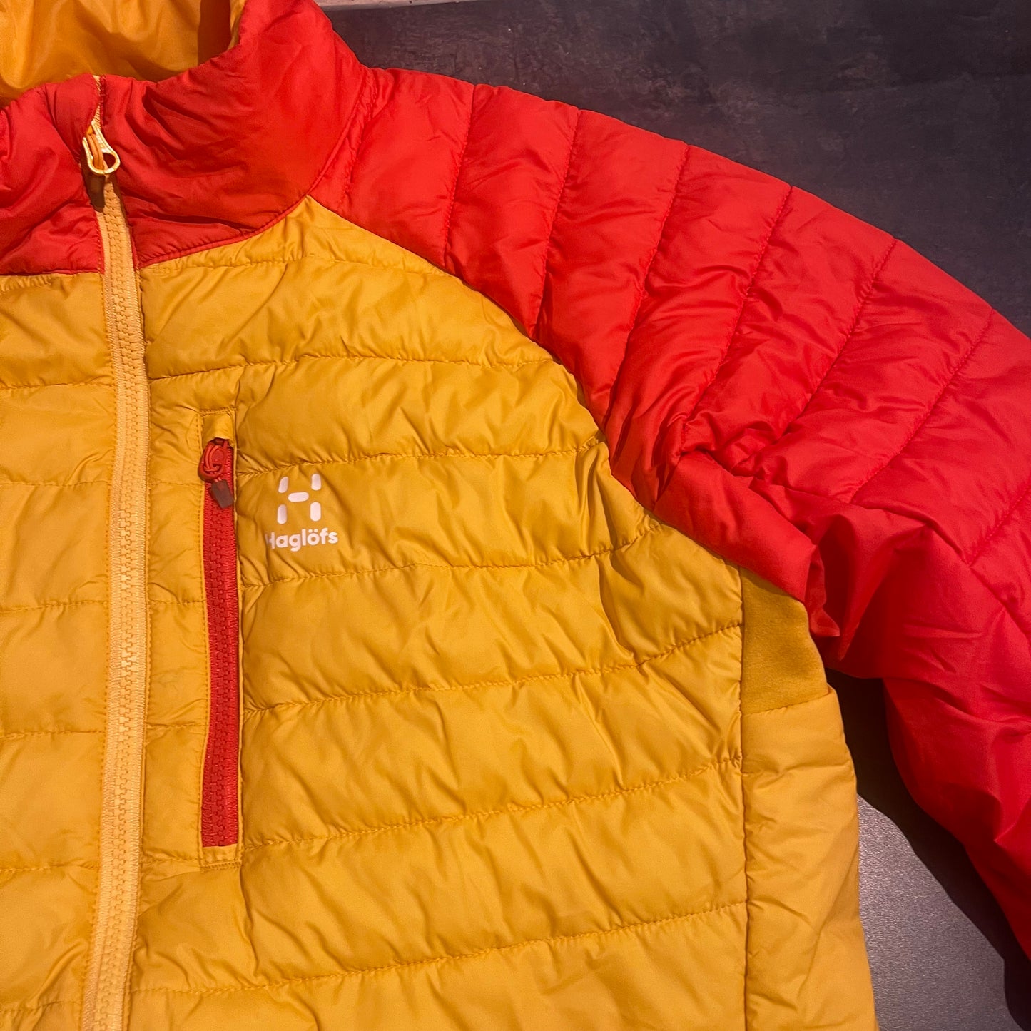 Isolations Stepp Jacke von Haglöfs (L Herren) Kunstdaune orange gelb