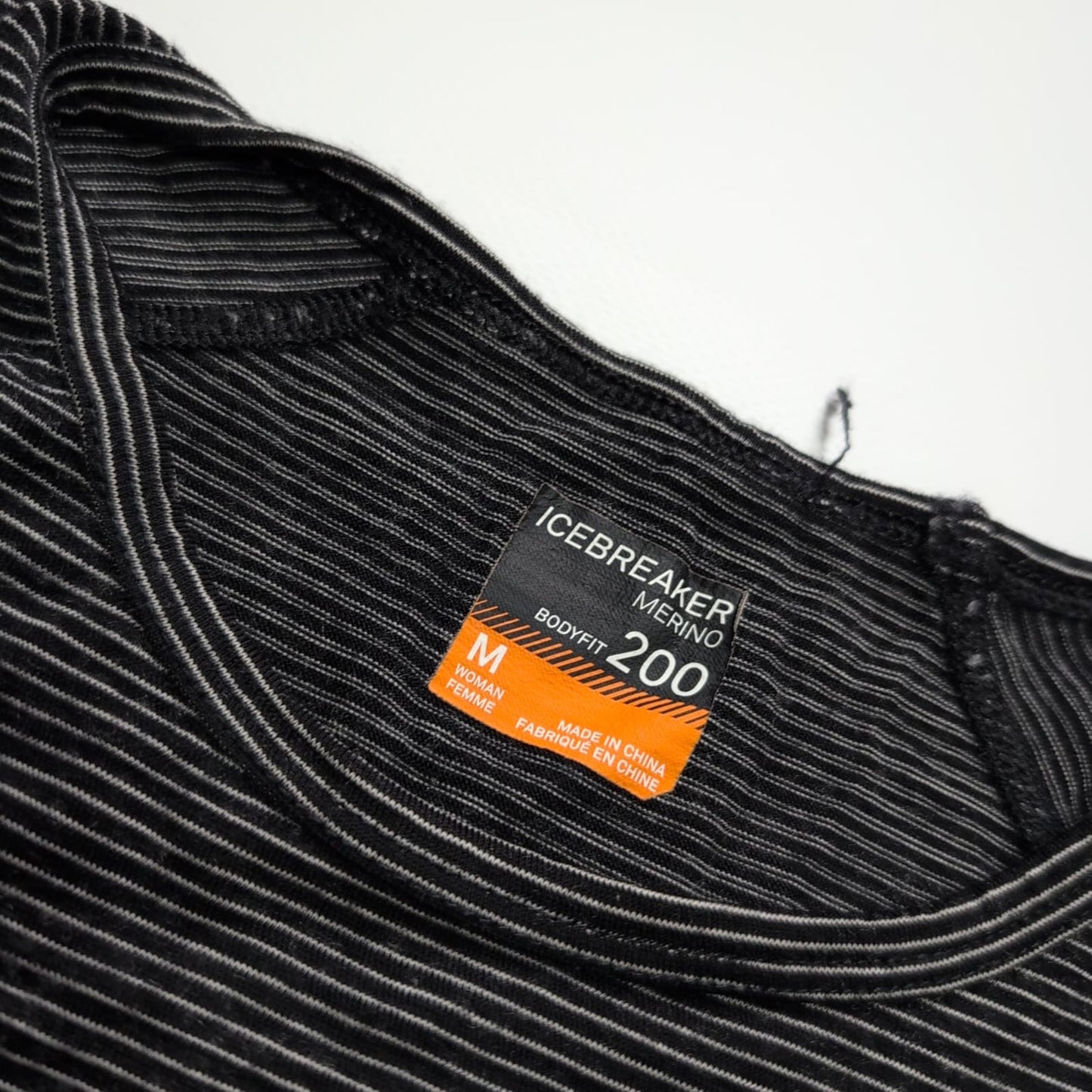 Merino 200 Longsleeve von Icebreaker (M Damen) Langarmshirt schwarz gestreift