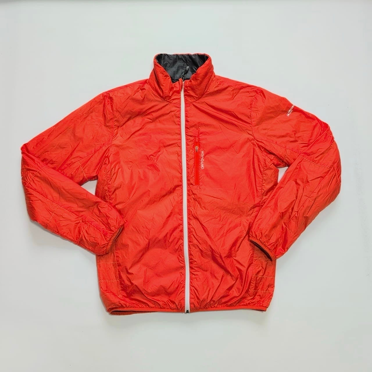 Wende Jacke Ortovox Wolle / Daune (XL Herren) schwarz orange