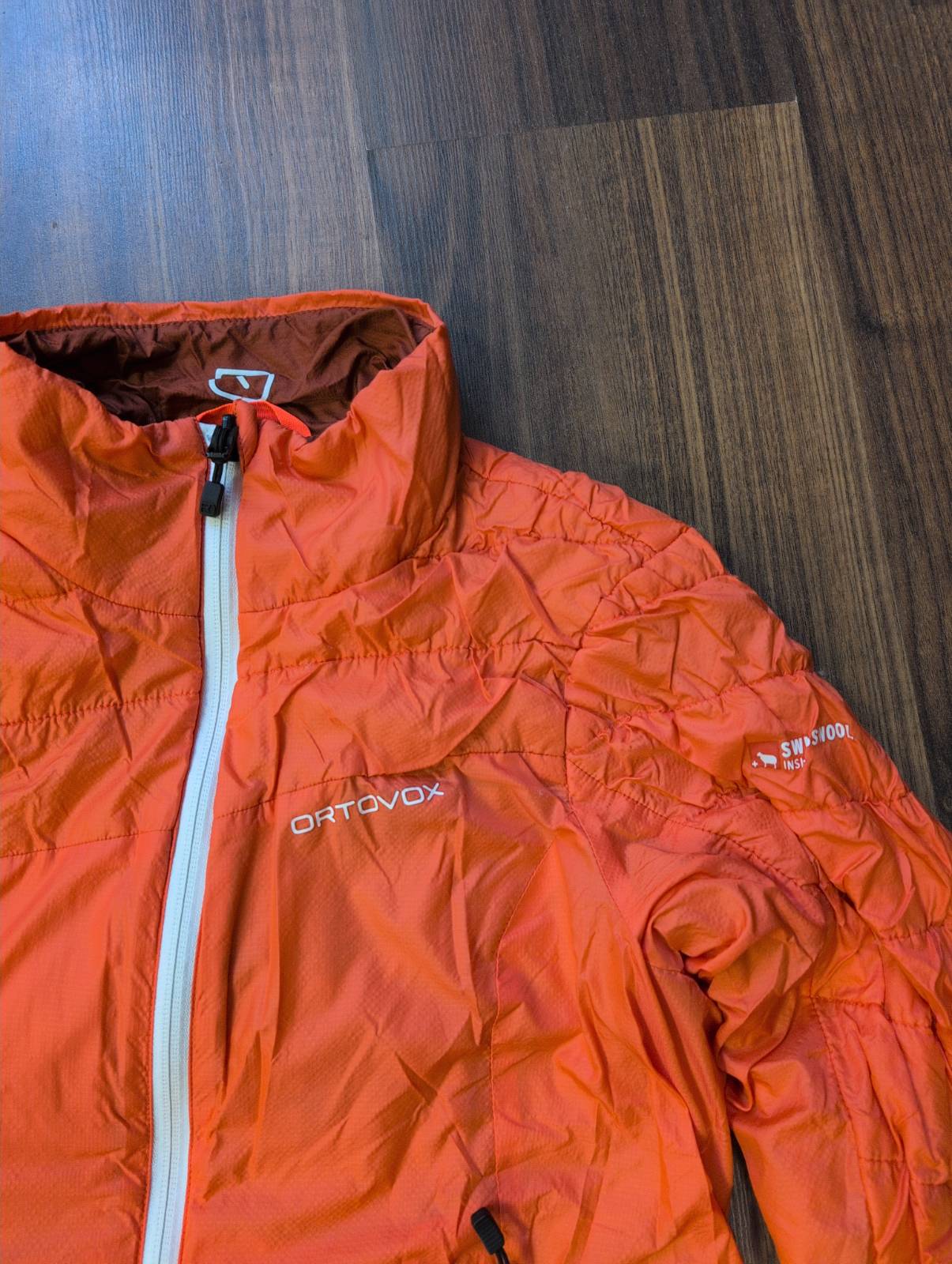 Daunen / Wolle Wende Jacke Ortovox (S Damen) bordeaux / korallenrot - wanderlich.com