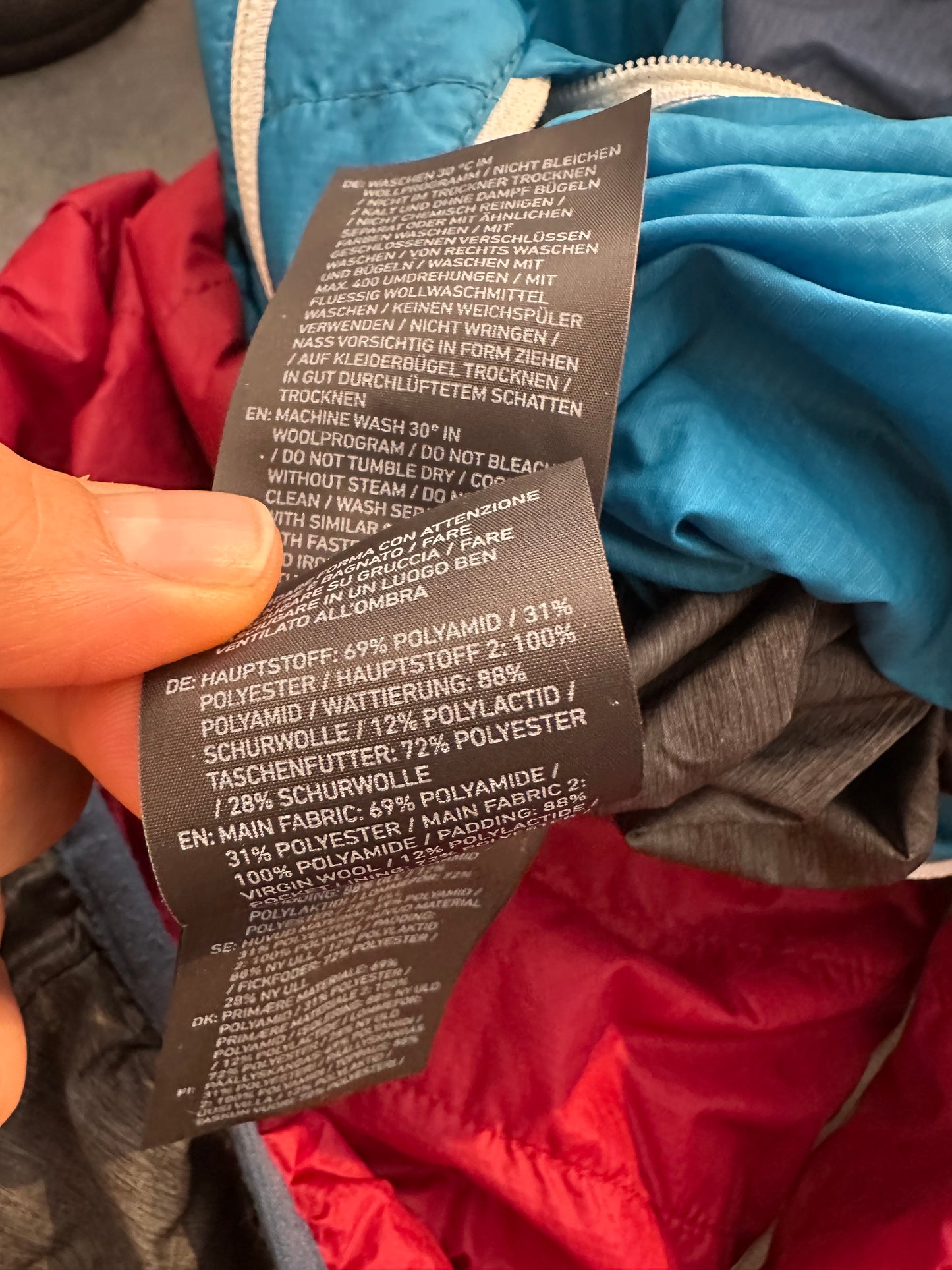 Wolle /Daunen Wende Jacke Ortovox (L Herren) rot blau graphit