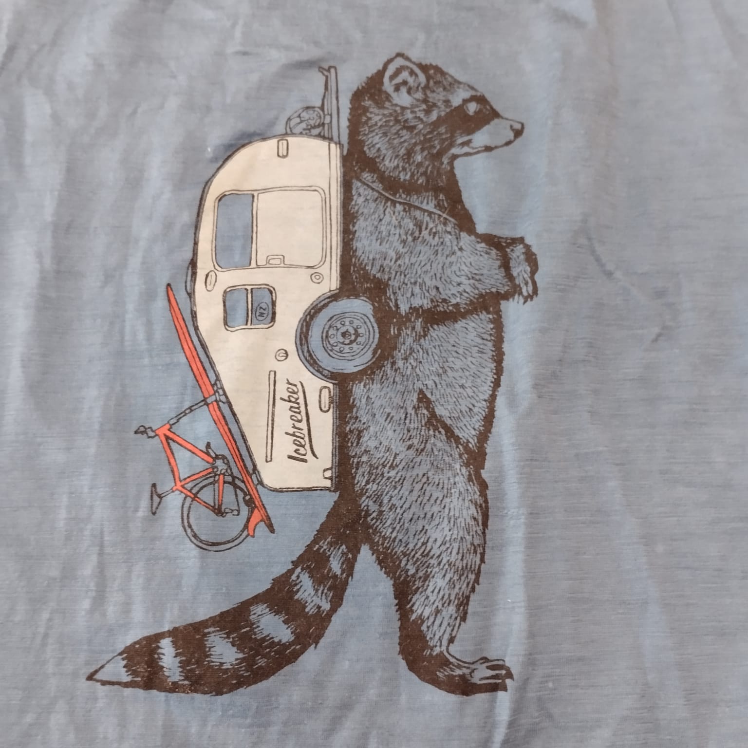 100% Merino T-Shirt von Icebreaker (XL Herren) blau Print Waschbär - wanderlich.com