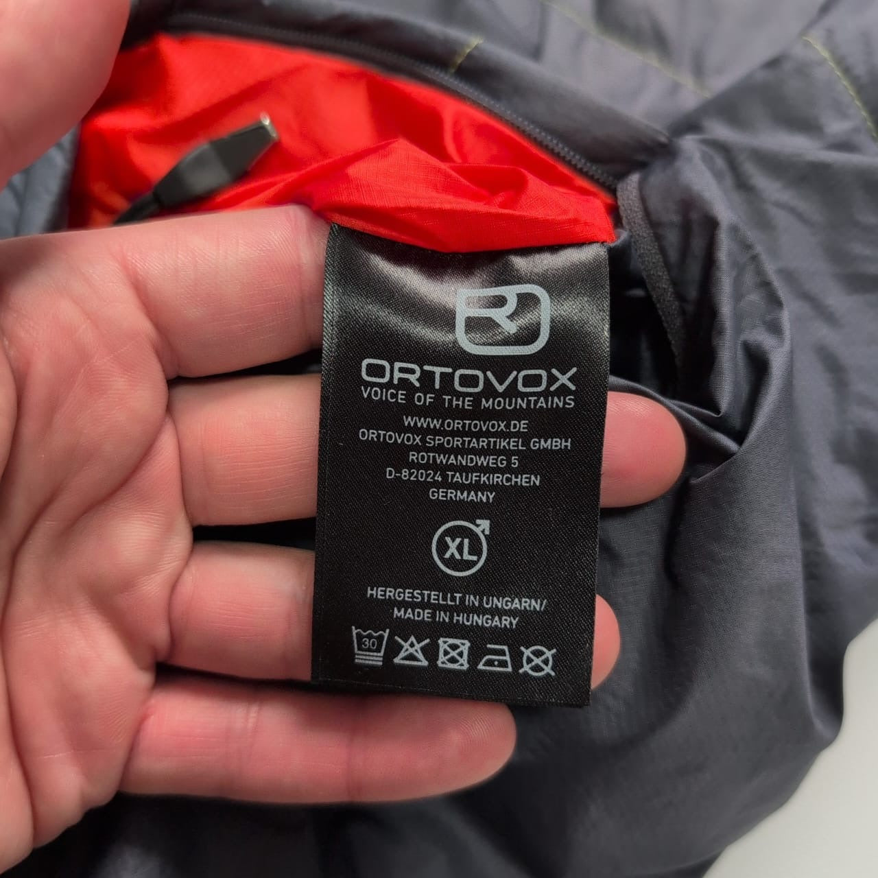 Wende Jacke Ortovox Wolle / Daune (XL Herren) schwarz orange