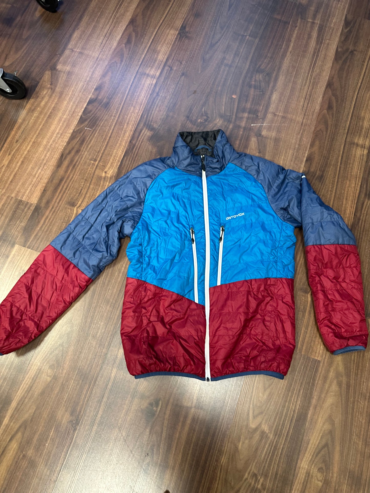 Wolle /Daunen Wende Jacke Ortovox (L Herren) rot blau graphit