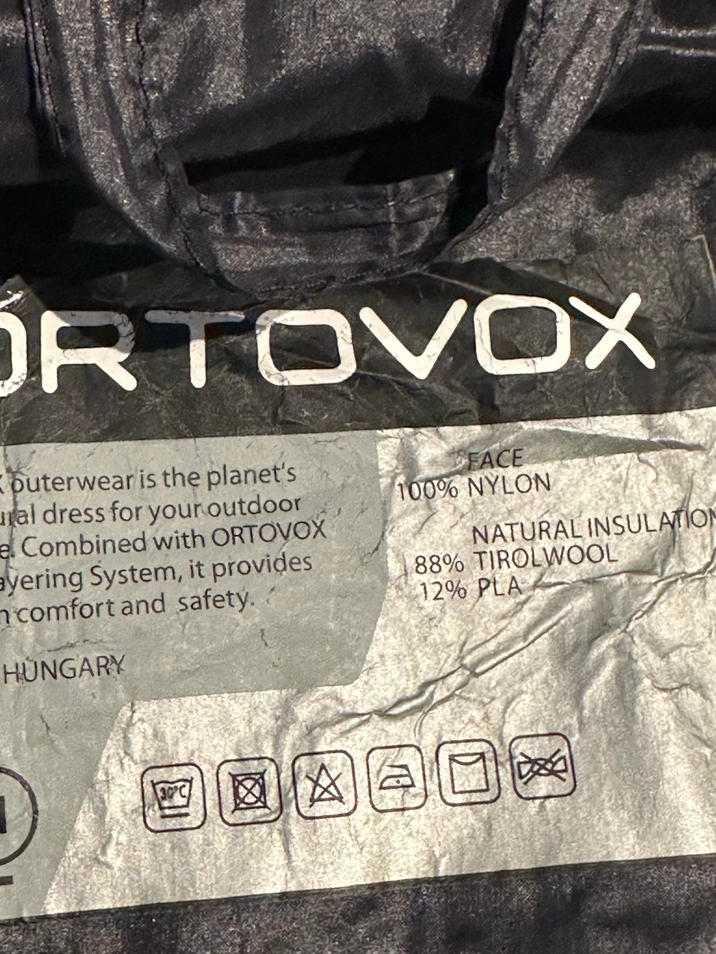Wolle / Daunen Isolation Jacke Ortovox (S Herren) schwarz mit Kapuze