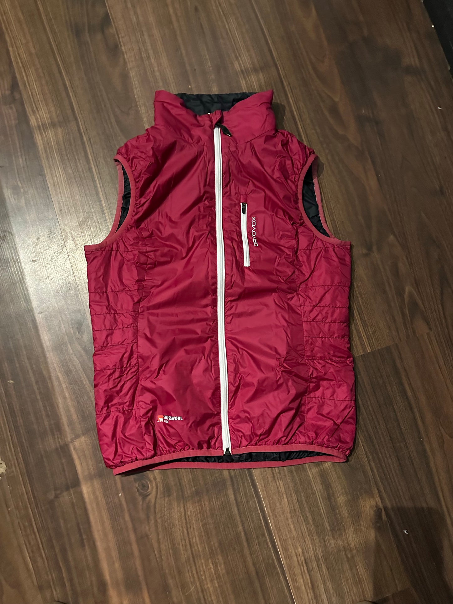 Wende Weste von Ortovox Swisswool Inside (M Damen) rot schwarz