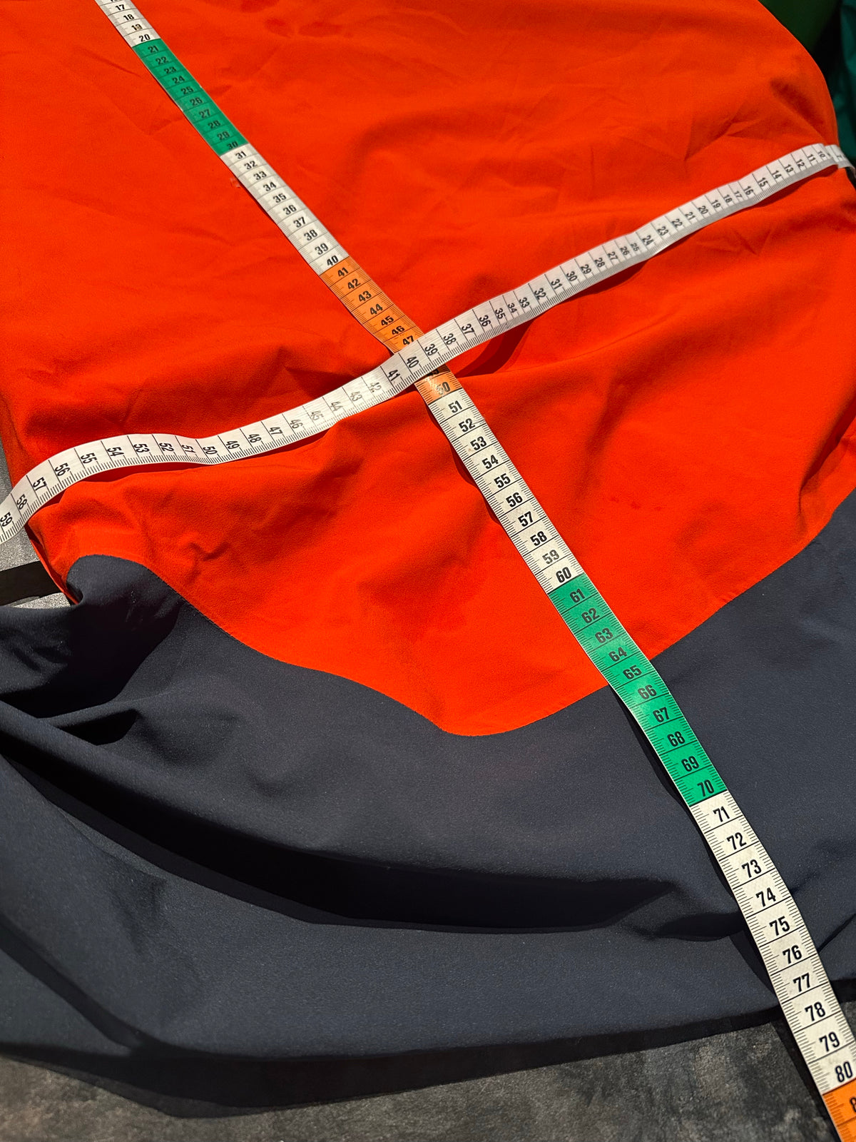 Regen Jacke McKinley (M Herren) orange schwarz