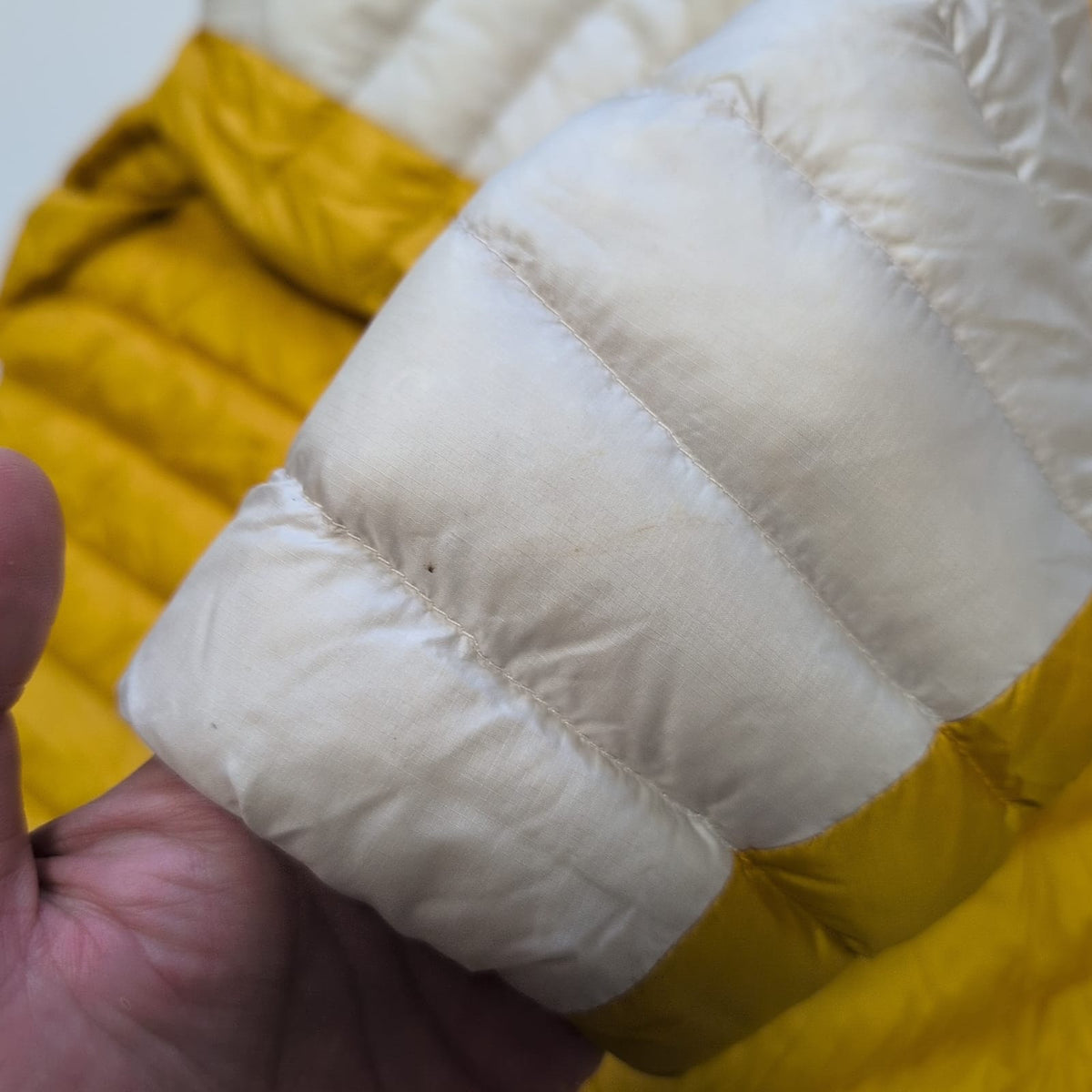 Daunen Jacke von Mammut (S Damen) gelb creme